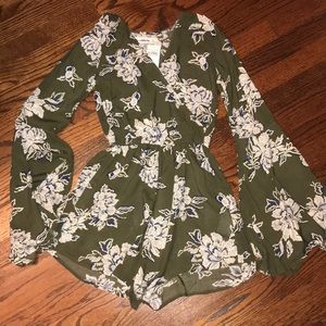 Forest green,navy, and white floral Romper.